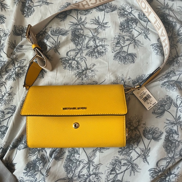 New Michael Kors Jet Set Item Large Wallet
Crossbody Jasmine Yellow NWT - Picture 8 of 12